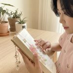 Open book with decorative flowers